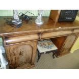 A 19TH CENTURY MAHOGANY SIDEBOARD UNIT having plain rectangular top with three inline concealed