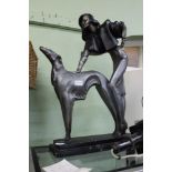 AN ART DECO DESIGN PAINTED CAST MODEL of a Lady and her Borzoi