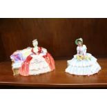 TWO ROYAL DOULTON FIGURINES OF SEATED LADIES