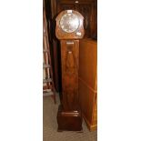 AN ART DECO DESIGN WALNUT CASED GRADMOTHER STYLE CLOCK with chiming movement