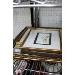 A SMALL GILT FRAMED MIRROR together with A PRINT OF A GERMAN MARKET TOWN, and two floral pictures
