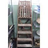 TWO SETS OF WOODEN FOLDING STEPS