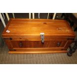 A MODERN PINE COLOURED BOX CHEST