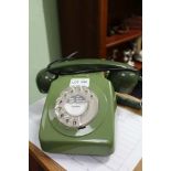 A VINTAGE DIAL TELEPHONE finished in two tone green