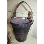 AN ANTIQUE LEATHER FIRE BUCKET