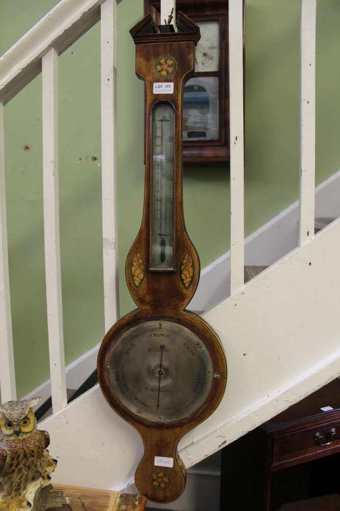 A DECORATIVELY INLAID WOODEN BACK BANJO BAROMETER THERMOMETER