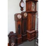 FOR SPARES AND REPAIRS; TWO OAK CASED GRANDMOTHER CLOCKS, one long cased clock and one Viennese