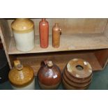 SIX PIECES OF DECORATIVE DOMESTIC STONEWARE, some impressed with merchant details