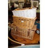 A SELECTION OF USEFUL WOVEN WICKER BASKETS