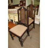 A PAIR OF CARVED BERGERE BACKED SINGLE CHAIRS with upholstered drop in seat pads