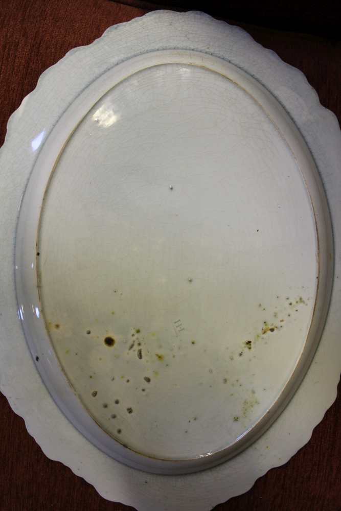 AN EARLY ENGLISH PEARLWARE MEAT DISH, of oval form with blue shell or feather edge, impressed mark - Image 2 of 2