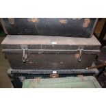 A METAL TRAVELLING TRUNK stencilled with the name of the military owner