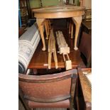 A MID 20TH CENTURY OAK FINISHED DRAWLEAF STYLE DINING TABLE on shaped plank support, together with