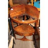 A GEORGIAN MAHOGANY CORNER WASHSTAND, with a three drawer fronted undertier