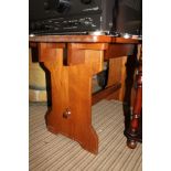 AN OAK FINISHED RECTANGULAR TOPPED PLANK BUILT COFFEE TABLE with pegged construction