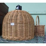 A WOVEN WICKER WORK LAMP SHADE in the form of a Lobster pot, together with a FIXED HANDLED BASKET