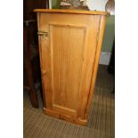 A PINE SINGLE DOOR BEDSIDE POT CUPBOARD