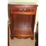 A REPRODUCTION MAHOGANY FINISHED SMALL SIZED SIDE CABINET with single drawer, and adjustable