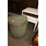 A LLOYD LOOM KIDNEY SHAPED LAUNDRY BASKET together with a painted bedside unit.