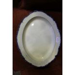AN EARLY ENGLISH PEARLWARE MEAT DISH, of oval form with blue shell or feather edge, impressed mark