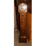 AN ART DECO DESIGN WALNUT CASED GRANDMOTHER STYLE CLOCK with chiming movement