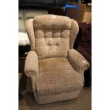 A GRAPHIC TEXTURED UPHOLSTERED MANUALLY RECLINING WINGBACK ARMCHAIR