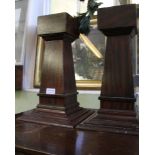 A PAIR OF DISPLAY PLINTH PEDESTALS with wood effect paint finish