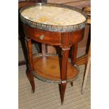 A FRENCH DESIGN WALNUT COLOURED TWO TIER OVAL OCCASSIONAL TABLE, having pierced metal gallery and