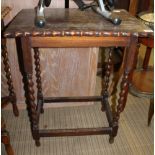 AN OAK RECTANGULAR TOPPED SIDE TABLE, with wavy edge, supported on barley twist and block legs, with