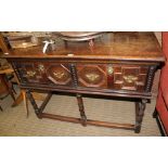 AN OAK DEEP FINISHED JACOBEAN DESIGN TWO DRAWER DRESSER BASE, on turned and blocked legs, with box