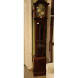 A REPRODUCTION MAHOGANY LONGCASE STYLE CLOCK having glazed single door with display pendulum and