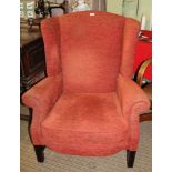 A PARKER KNOLL DEEP SEATED WING BACK GEORGIAN DESIGN ARMCHAIR with show wood legs, all over