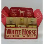 WHITE HORSE "EIGTHS" 11 x 3 1/3 fl.oz bottles in original advertising carton together with a 9.4cl