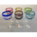 A set of six multi coloured bohemian hock glasses.