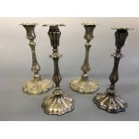 Two pairs of decorative candlesticks. Heights approximately 26cm.