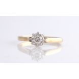 A hallmarked 9ct yellow gold diamond solitaire ring, set with a round brilliant cut diamond,