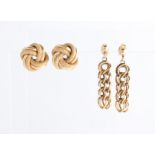 Two pairs of earrings, one of knot design, stamped 375, the other hallmarked 9ct yellow gold of drop