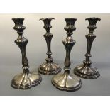 Two pairs of candlesticks. Heights approximately 27cm.