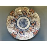 A Japanese charger with Imari design. Diameter 46cm.
