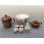 A Yixing teapot and lidded mug, four small Chinese boxes, a small vase painted with flowers and rice