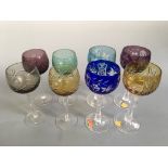 Two sets of four bohemian glass hock glasses.