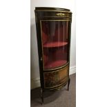 A Napoleonic style bow front corner display cabinet with single glazed door and painted scene to