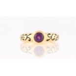 An amethyst, diamond and enamel ring, centrally set with a round cut amethyst, measuring approx.