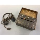 A The Telephone Manufscturing Company Wireless Crystal Recieving Set with headphones.
