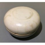 A Song dynasty lidded powder box with faded pattern. Diameter 9.5cm.