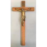 A wooden crucifix with metal figure of Christ.