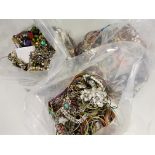 Three bags of costume jewellery.