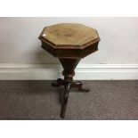 A walnut sewing table.