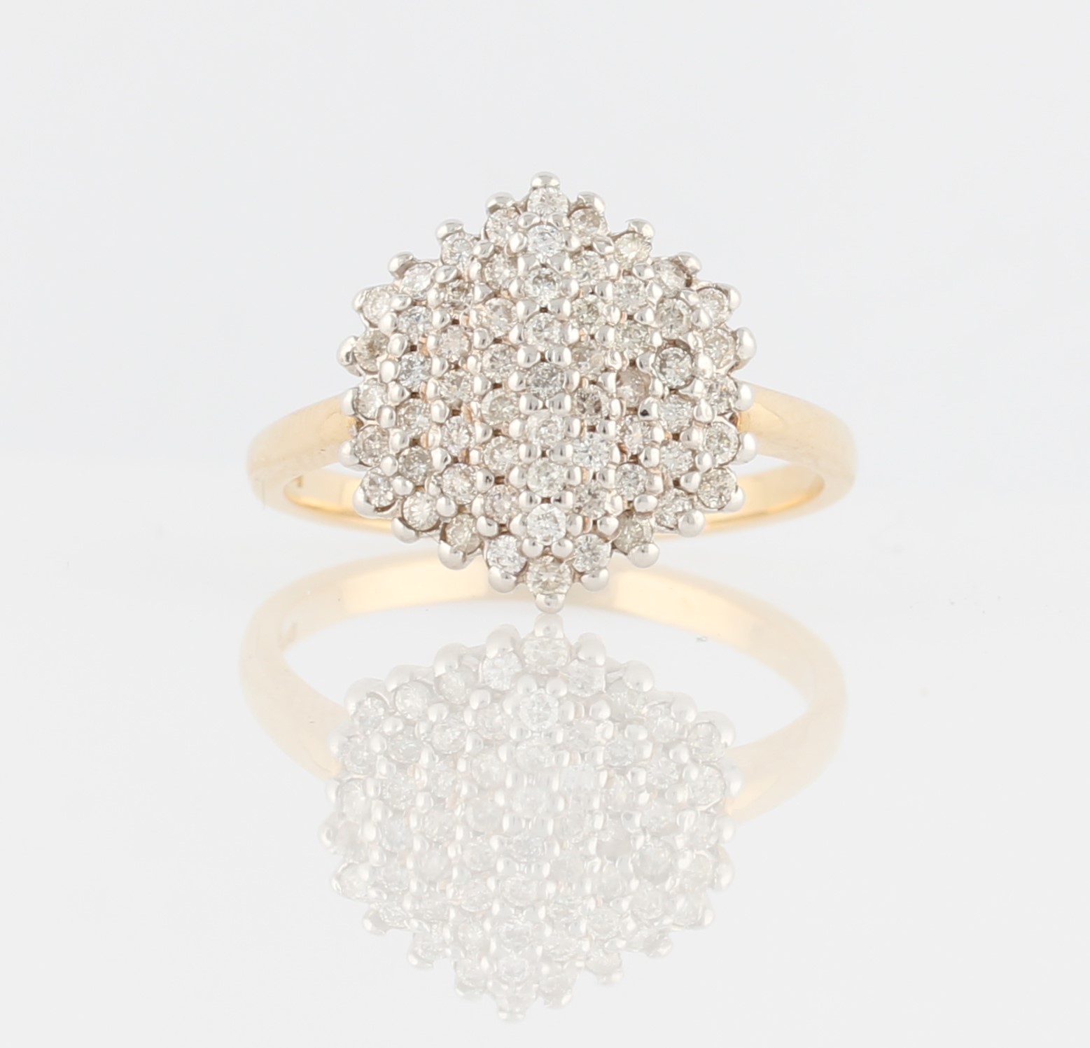 A hallmarked 9ct yellow gold diamond cluster ring, set with approx. 61 round brilliant cut diamonds,