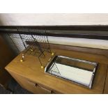 An Art Deco style mirror tray with metal newspaper rack.